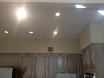 Cabinet painting & Re-set light installation in Katy, TX